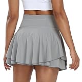 La mini jupe de tennis grise est facilement assortie avec des t-shirts, des débardeurs, des vestes, des sweats à capuche, des caraco et d'autres hauts. Les vêtements de sport sont la combinaison parfaite de la mode et de la santé