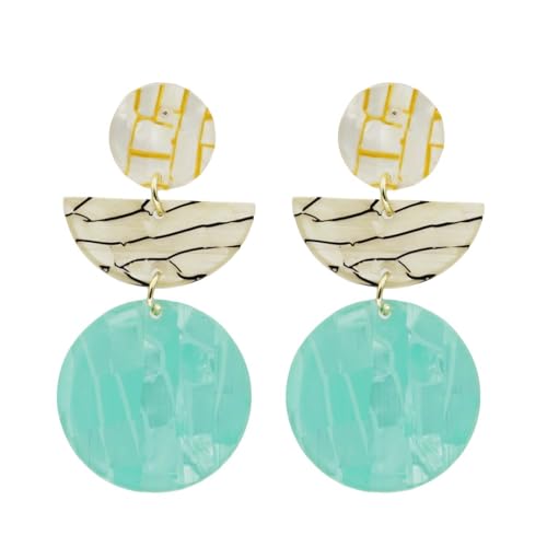 Bijoux d'oreilles oversize en résine pour sublimer vos looks printaniers