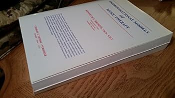 Paperback Improvisational Models of Music Therapy Book