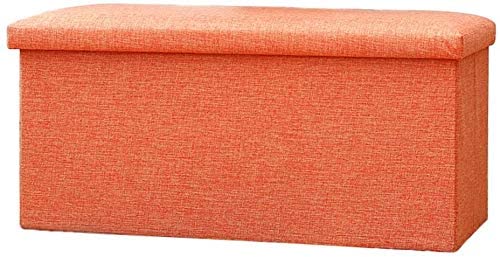 Banc pliant gain de place orange pour désencombrer le salon