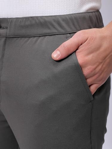 Image of The Indian Garage Co Men Slim Fit Solid Mid-Rise Stretchable Knitted Jogger Trousers