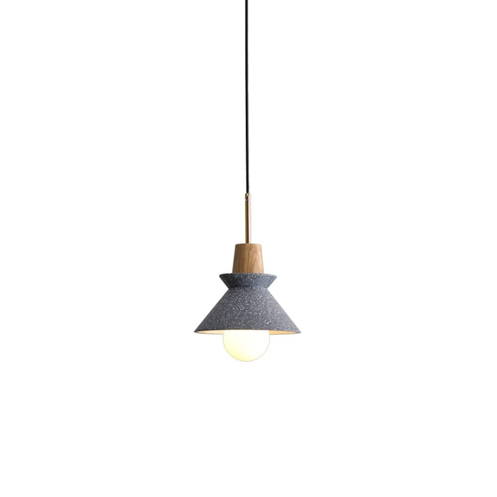 Lustre de chevet en résine et fer pour éclairer votre coin lecture de chambre