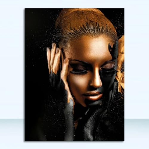 Art africain femme toile noir or pour raviver un mur blanc de salon