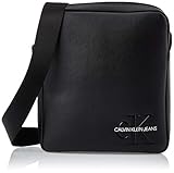Diese kleine Calvin Klein Tasche gehört mit ihren Funktionen und ihrer Qualität zu den unverzichtbaren Accessoires im Alltag! Individuell können Sie den Schulterriemen an Ihre Größe anpassen und optimalen Tragekomfort genießen. Maße: 24 x 27 x 7 cm