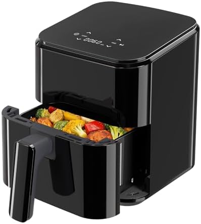 Close-up view of the air fryer's control panel and handle.