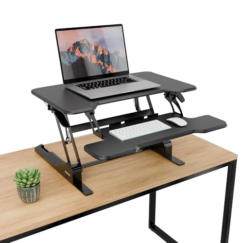 Image of Mount-It! Height Adjustable Standing Desk Converter, Compact 30 inch Wide Tabletop Standing Desk Riser with Gas Spring, Desktop Stand Up Workstation with Keyboard Tray Fits Monitor or Laptop, Black