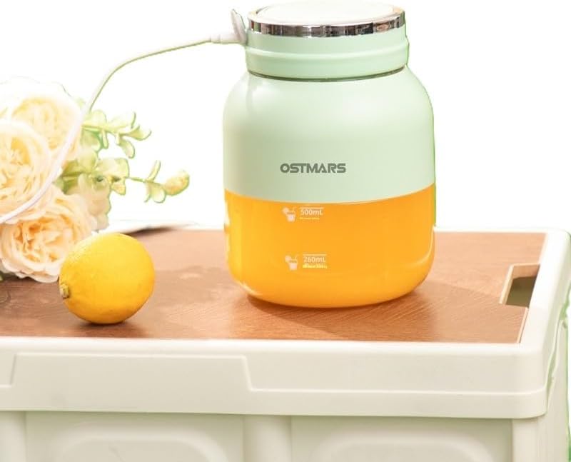 OSTMARS Portable Electric Juicer Blender filled with orange juice, showing 500mL and 250mL measurement markings.