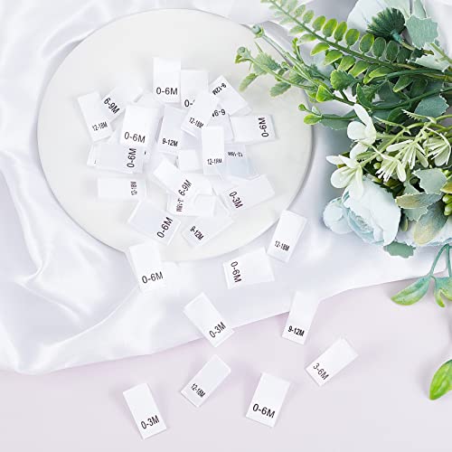NBEADS 600 Pcs Clothing Month Labels, 6 Styles Cloth Sewing Labels Embroidered Label Size Labels Tags for Clothing Sewing Sew on Clothes, White