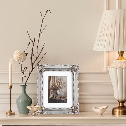 Image of Saysmile 8x10 Vintage Picture Frame with Embossed Flower Design, Silver Ornate Frame for 8x10 or 5x7 Pictures with White Mat, Hand-Crafted Resin Antique Frames for Tabletop & Wall Hanging, Home Decor (Silver)