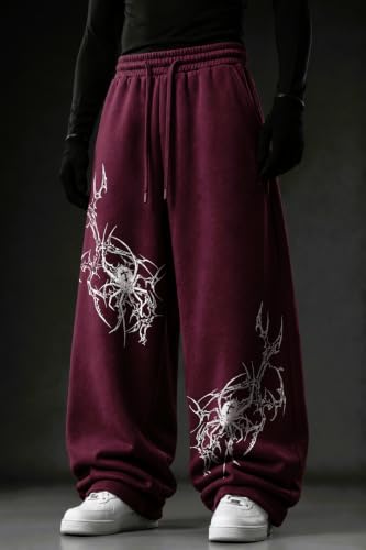 Image of Aesthetic Gothic Wide Leg Pants for Men | Tribal Print Baggy Streetwear | Oversized Track Pants with Elastic Waist | Black and White Relaxed Fit Bottoms