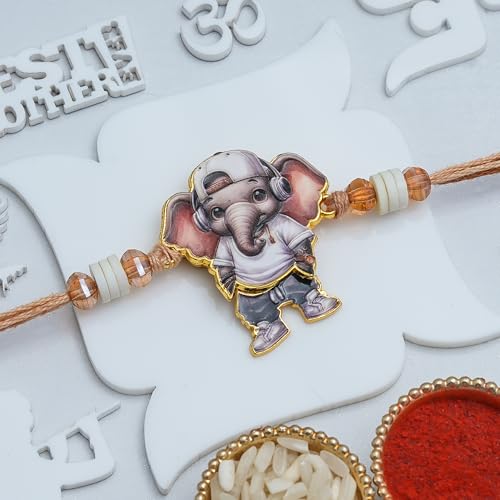 Image of eCraftIndia Cartoon Style Baby Elephant Rakhi for Kids Girls Boys with Best Bro Ever Fridge Magnet | Raksha Bandhan Kids Rakhi for Brother Bhaiya Bhai | Roli Chawal Pack