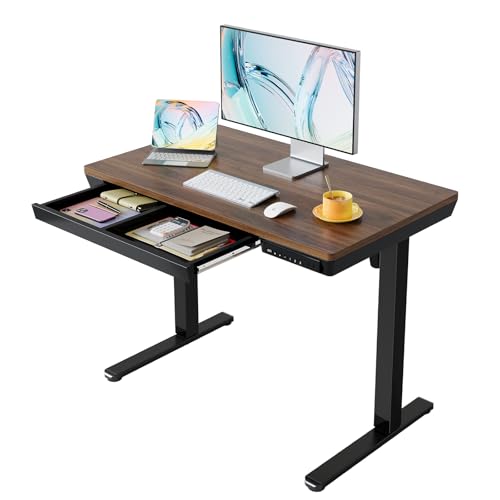 Image of HUANUO ONE PIECE Electric Standing Desk, Height Adjustable Desk with Drawer, 100 x 60cm, Sit Stand Desk with USB Charging Ports & 3 Memory Height Settings, Black Walnut Wood, Home Office