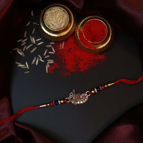 Image of Oblivion Artistic Peacock Rakhi Set of 2 for Brother with Silver Colour Pooja Coin, Tilak Set and Greeting Card for Raksha Bandhan Celebration