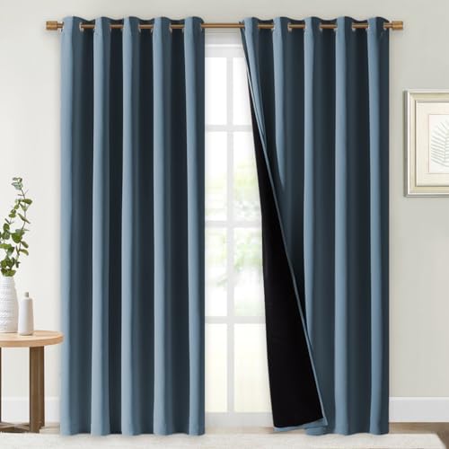 Image of NICETOWN 100% Blackout Window Curtain Panels, Smoky Blue, 2 Pieces, 70 inch Wide Each Panel, Cold and Full Light Blocking Drapes with Black Liner for Nursery, 84 inch Drop Thermal Insulated Draperies