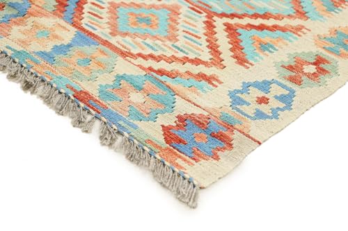 Tapis Kilim afghan tissé main en laine chargé d'histoire