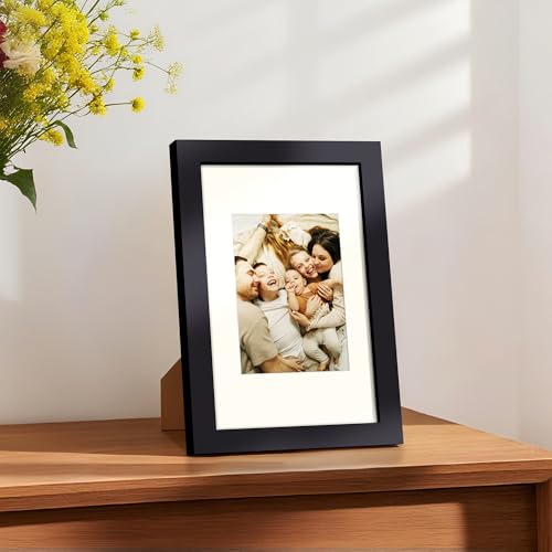 Image of upsimples 5x8 Picture Frame, Display Pictures 3.5x5 with Mat or 5x8 Without, Wall Hanging Photo Frame, Black, 1 Pack