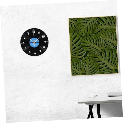 Mecanisme a rotation inverse pour cette horloge decorative d'exception