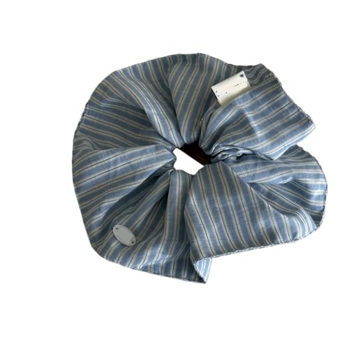 Chouchou en soie bleu nuit élastique accessoire cheveux chic pour coiffure élégante