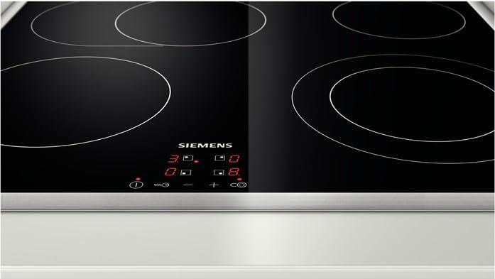 Yn agos view of the Siemens ET645HN17E Electric Hob's touch control panel and illuminated digital display, showing active cooking zones.