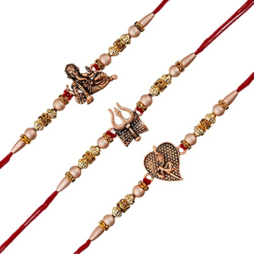 Image of eCraftIndia Set of 3 Designer Rakhis for Brother with Cute Brother-Sister Showpiece, Best Bro Ever Fridge Magnet & Roli Chawal Pack | Ganesha, Radha Krishna & Trishul Rakhi | Raksha Bandhan Gift