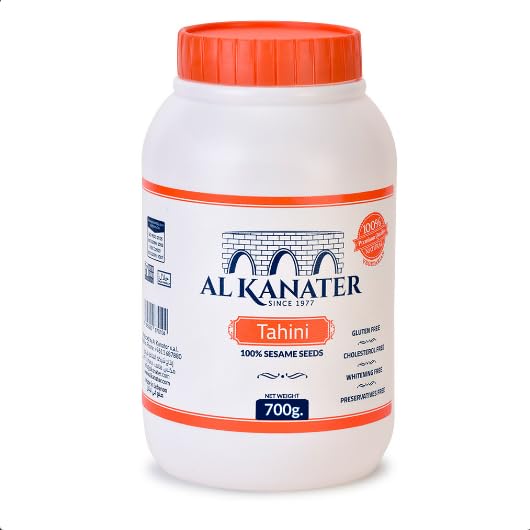 Al Kanater Tahini Sesame Paste 700 Gr All Natural Ground Sesame Seeds Rich Creamy Taste For Hummus Sauces Baba Ghanouj and Halawa.