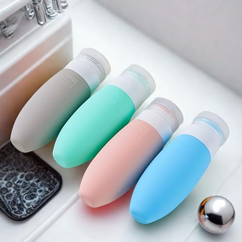 Image of Hian Travel Bottles Kit for Toiletries - Leak-Proof, Refillable & Squeezable Silicone Containers Set (Multicolor, Pack of 4) - Perfect Toiletry Organizer for Shampoo, Lotion & Cream