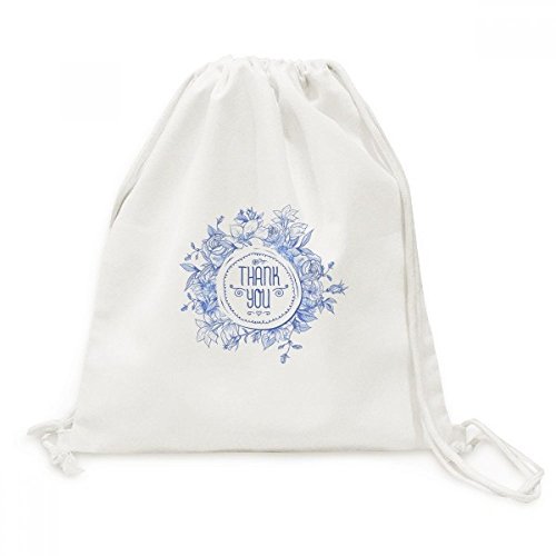 Toile drawstring backpack bleu fleurs rose pour éviter les sacs lourds en voyage