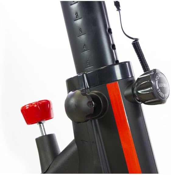 Close-up of the BH Vienna Indoor Cycling Bike's resistance knob and vertical adjustment mechanism