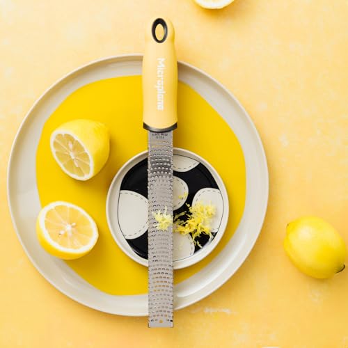Image of Microplane Premium Classic Zester Grater in Lemon Cream color - Vibrant Color | Lemon Zester tool, Cheese & Vegetable Grater | For Citrus, Parmesan Cheese, Garlic, Ginger | Fine Stainless Steel Blade