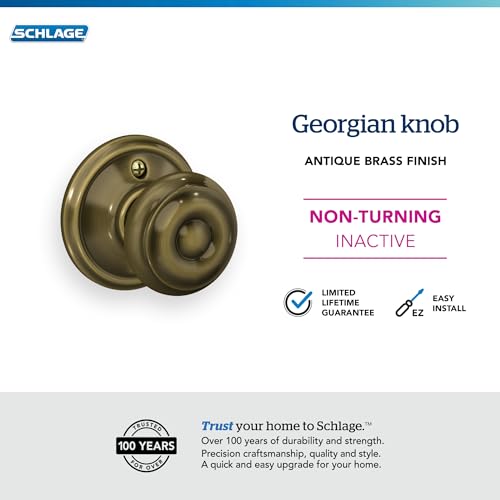 Image of Schlage F170 GEO 609 Georgian Door Knob, One Sided Non-Turning Dummy Door Handle, Antique Brass