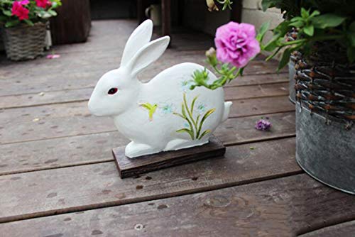 Statue de lapin extérieur horizontal pour embellir un parterre fleuri