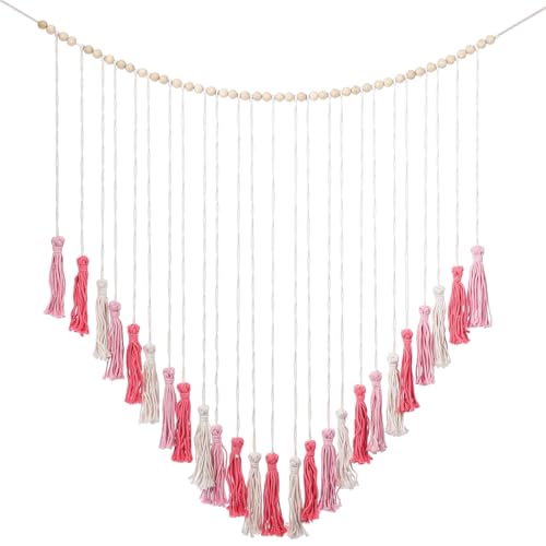 Tapiz de macramé bohemio rosa para decorar tu dormitorio o salón con calidez