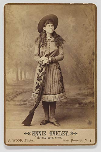 Home Comforts Portrait of Annie Oakley-12 Inch by 18 Inch Laminated Poster-Posters with Bright Colors and Vivid Imagery-Convenient 12 Inch by 18 Inch Size Fits Perfectly in Many Attractive Frames