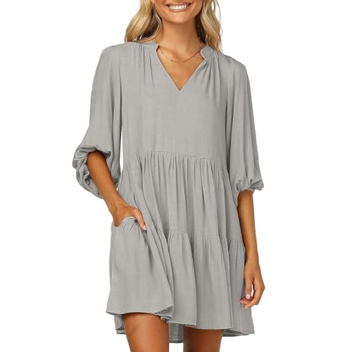 Robe col en V à manches bouffantes aux finitions soignées