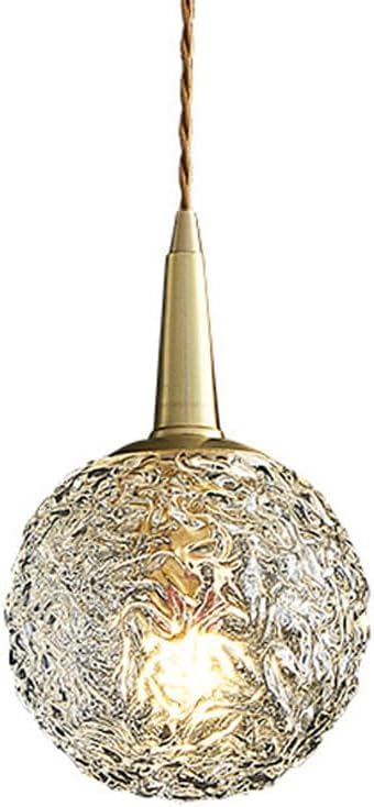 Lampe suspendue cristal et ondulations d'eau pour table de salle à manger chaleureuse