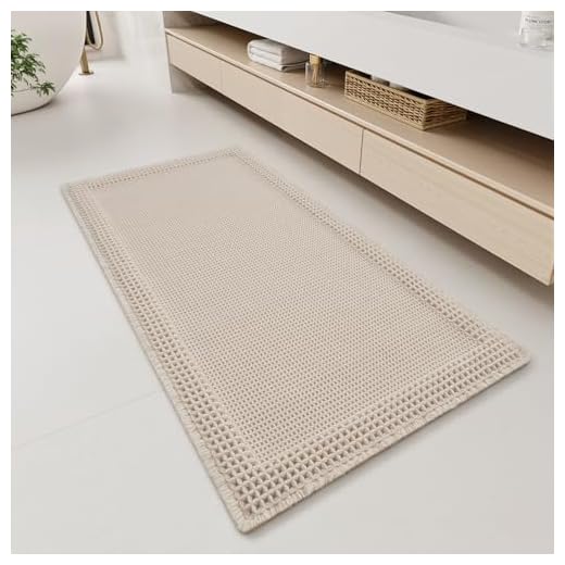 RESARE Waffle Bathroom Runner Rugs, Super Absorbent Bath Mat Non Slip Washable Quick Dry, Upgraded Ultra Soft Boho Bath Rugs with Tassels for Hallway Bedroom Laundry Room, 2'x4'(24"x48"), Pale Beige