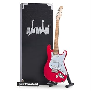 EXPERIENCE OUR RANGE OF MINIATURE GUITARS: Experience the magic of his guitar on a smaller scale with our collection of miniature guitars, each one a tribute to the legends who played them. CRAFTED WITH PRECISION: This 10in/25cm wooden Miniature guit...