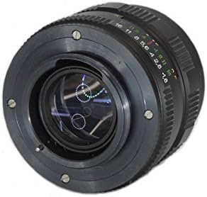 Өнцөгтэй view of the Helios 77M-4 50mm F1.8 lens, showing the barrel and mounting side.