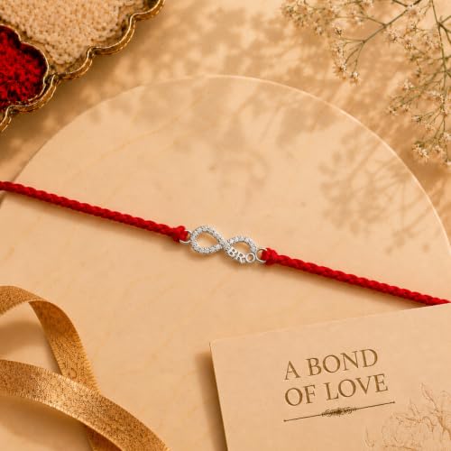 Image of MAIRA 925 Sterling Silver Premium Designer Bracelet Rakhi for Brother | Handmade Raksha Bandhan Sacred Thread with Silver-Tone Geometric Charm & Adjustable Red Braided Cord | Traditional Festival Rakhi Gift (FLOWER)