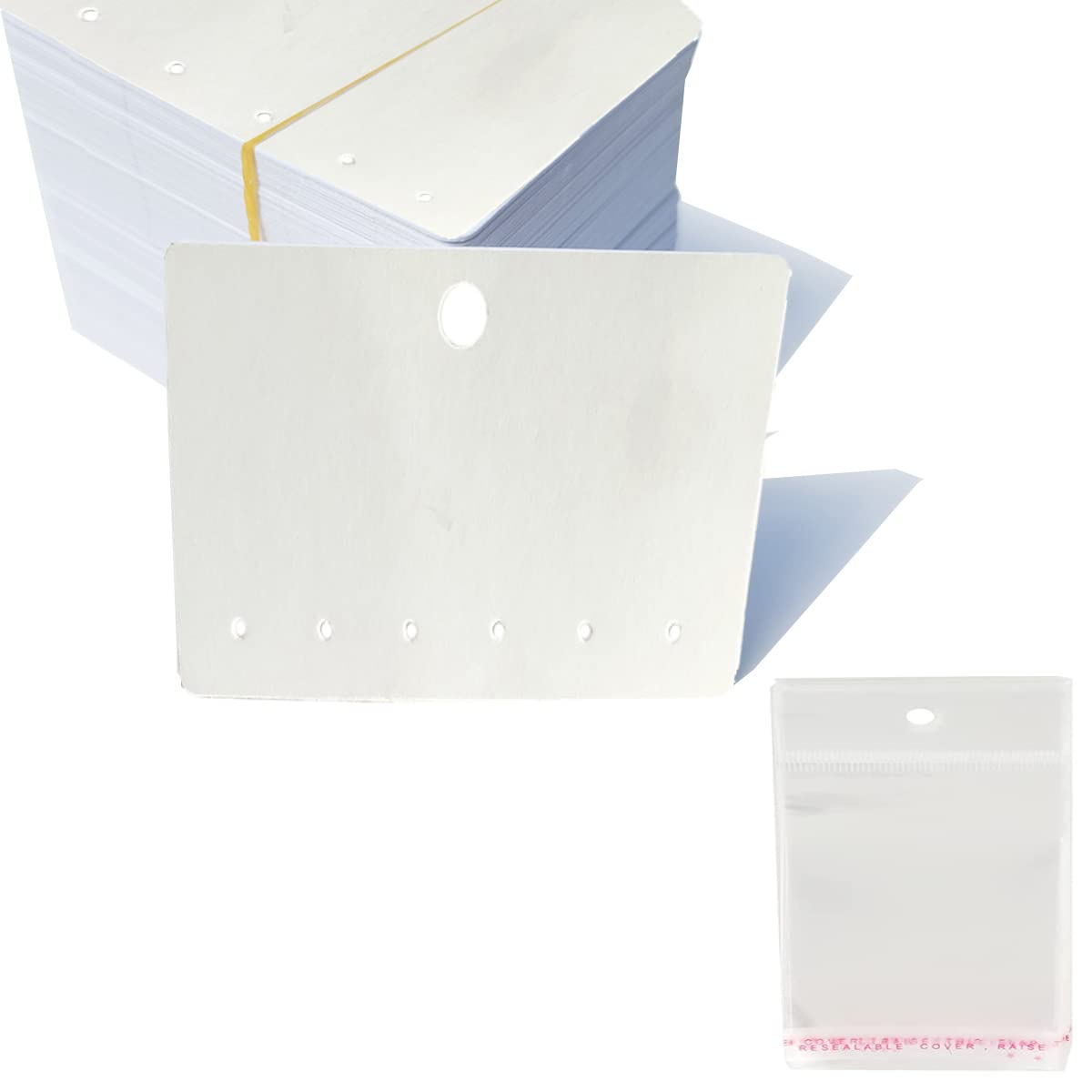 Pochettes cellophane transparent et cartes kraft : écrin épuré pour bijoux