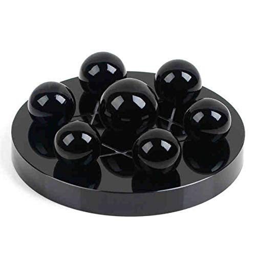Boule de cristal noire et décoration sept étoiles pour harmoniser votre salon