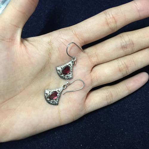 Boucles d'oreilles grenat pendantes pour sublimer vos soirées