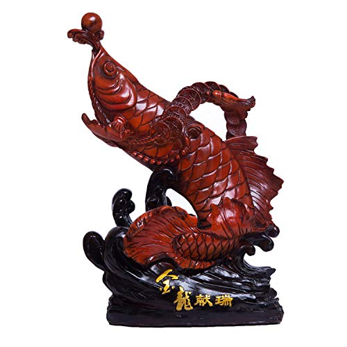 Petite statue de poisson rouge pour égayer le tableau de bord