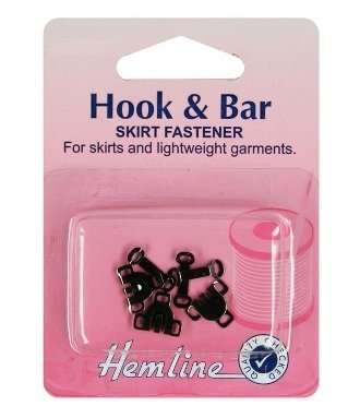 Hemline - Elementi di fissaggio per pantaloni