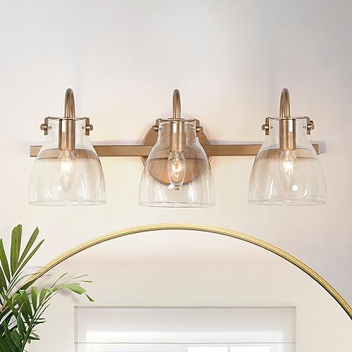 Image of KSANA Gold Bathroom Light Fixtures, 3-Light Modern Vanity Lights for Powder Room, Brass Bathroom Vanity Lights Over Mirror with Clear Glass Shade