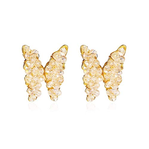 Boucles d'oreilles cristal scintillant et aile peluche pour rayonner lors de vos soirées