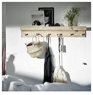 ledieu MÅNSARP Display Shelf installed on a wall with items