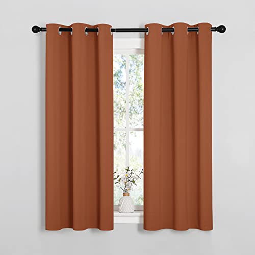 Image of NICETOWN Blackout Halloween Draperies Curtains for Girls Room, Nursery Essential Thermal Insulated Grommet Top Blackout Panels (Burnt Orange, 1 Pair, 34 x 54 inches)