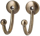 porte embrasse pour rideau Ateliers 28 propose des tringles métalliques à l'aspect vieilli, comme patiné par le temps, particulièrement authentiques