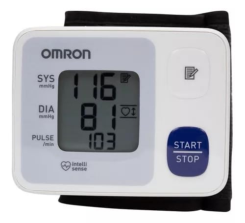 Diagram showing correct and incorrect wrist cuff placement for blood pressure measurement.